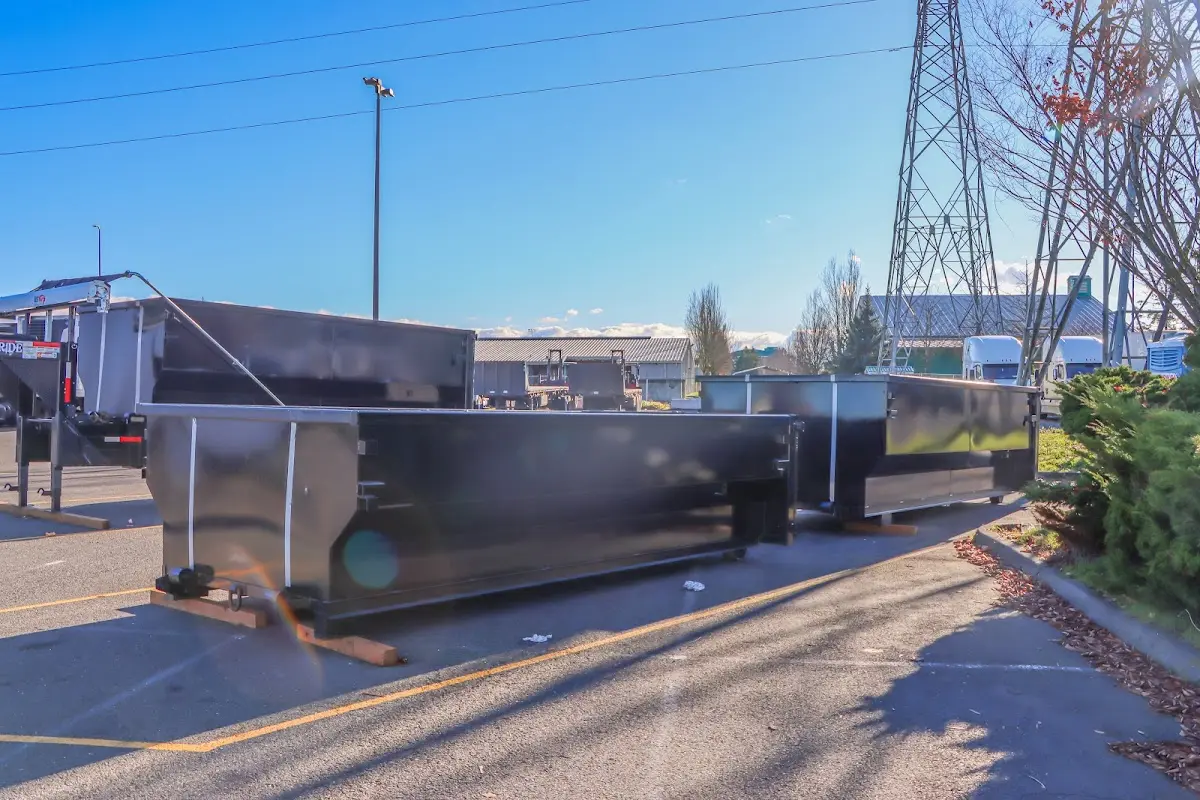Roll-off dumpster ready for waste disposal at job site for Construction Dumpster Rental in Council Bluffs